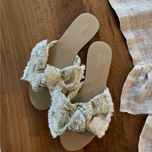 ALDO Flat Sandals with Gold Bow